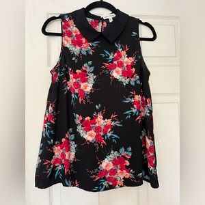 Faith and joy Los Angeles black floral blouse with Peter Pan collar.